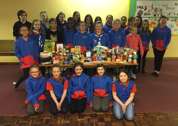 The 5th Lancaster Guides with their collection for Morecambe Bay Foodbank.