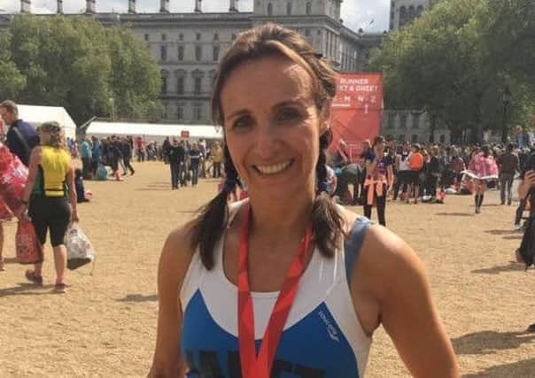 Janet Silverwood finished the London Marathon despite suffering from hamstring and calf injuries...and was back holding her fitness class in Heysham the next day!