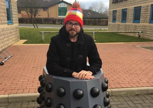 One of the Morecambe comic-con organisers, Gary Jones, posing in half a Dalek.