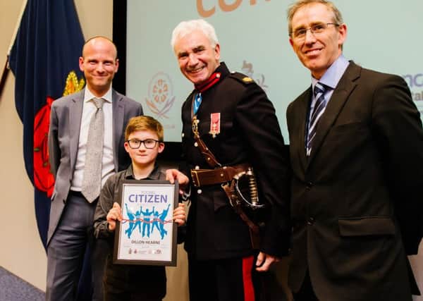 Dillon Hearne receiving his highly commended award from the High Sheriff.