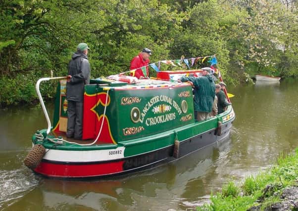 The Waterwitch canal boat on Lancaster Canal.