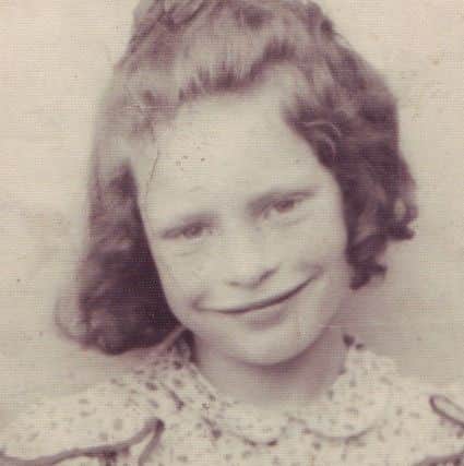 Taken from Ann Burgess's collection of St Joseph's Catholic Primary School in Lancaster. This picture shows Ann, who attended St Josep's, aged seven.