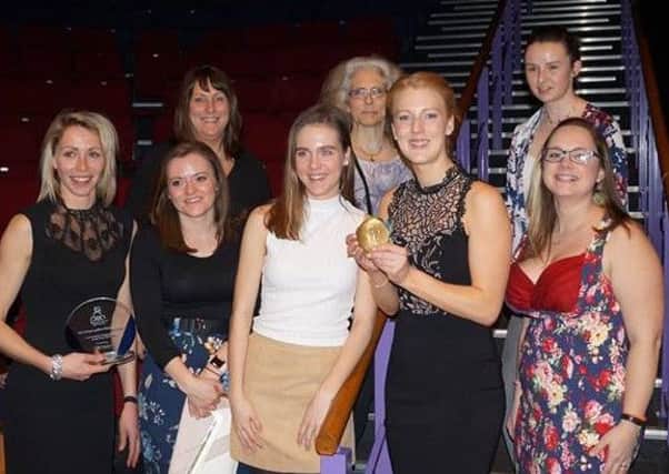 Committee members collect their awards at Preston Sports Awards from Great Britain international Nicola White