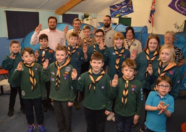 Members and leaders of the 1st Overton Scouts along with (back left) Lewis Stokes of Banks Renewables, which provided the grant from the community benefits fund linked to its nearby Heysham South wind farm.