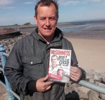 Motorcycling star John McGuinness with his new autobiography 'Built For Speed'.