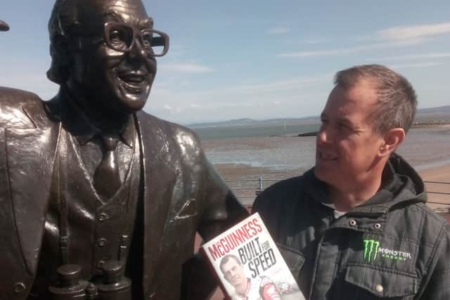 John shows off his new book to another Morecambe icon!