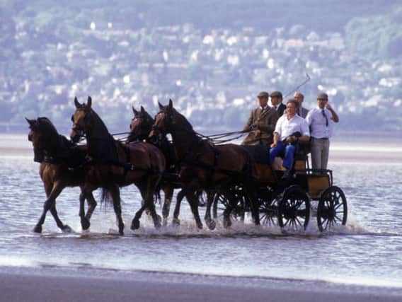 Duke of Edinburgh competes in the Holker Hall Carriage Driving Trials across Morecambe Bay on May 30, 1985