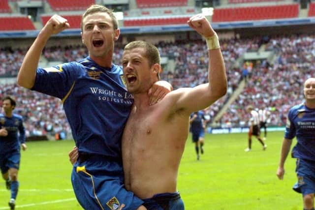 Garry Hunter and Danny Carlton celebrate victory at Wembley in 2007.