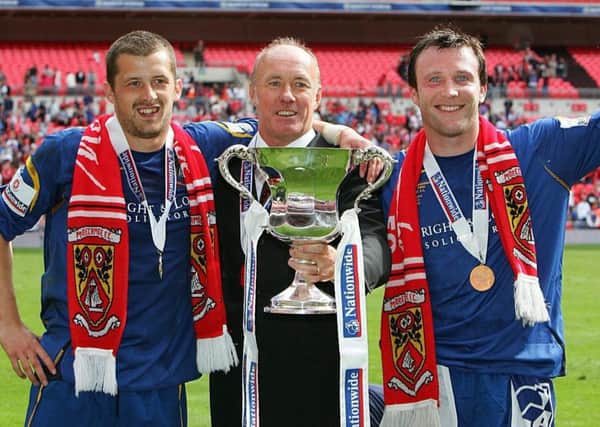 Wembley goalscorers Danny Carlton (left) and Garry Thompson (right) celebrate with manager Sammy McIlroy.