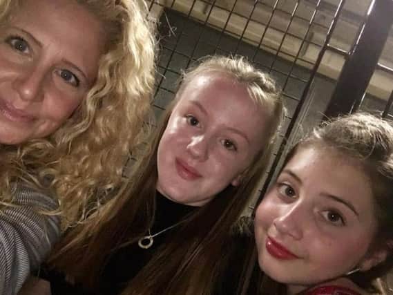 Rachel Dand, with her daughter Leah (right) and her friend Bella as they arrive at the concert last night just hours before the bomb blast