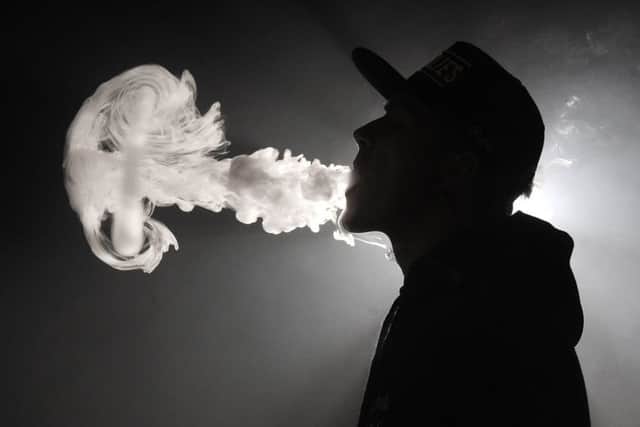 Jack Slinger from Up In Smoke demonstrates the art of vaping.
