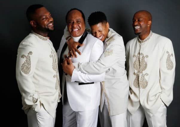 Ray Lewis (second from left) former lead singer with The Drifters with band Still Drifitng.