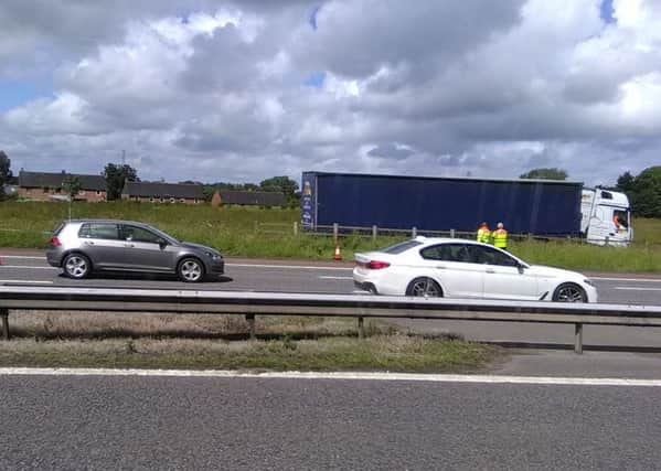 Lorry goes off the road on the M6 northbound near Forton.