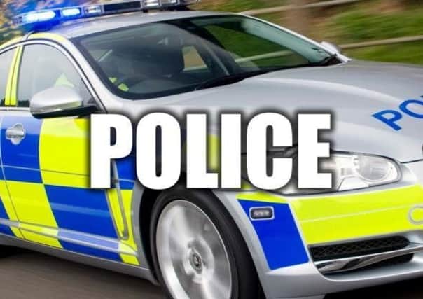 Police were called after a man was seen lying in the street in Morecambe.