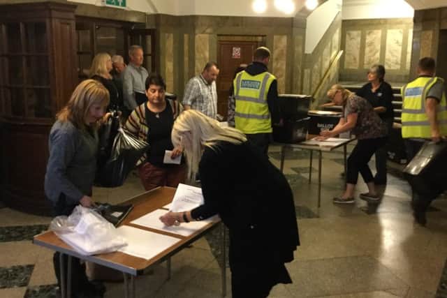 Ballot boxes arrive at Lancaster Town Hall on Thursday night.