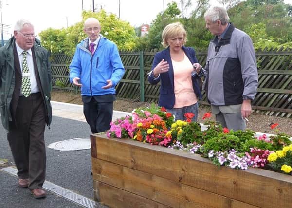 Debs Gourlay (second from right), next to David Croxall (second from left) with Britain in Bloom judges last year.