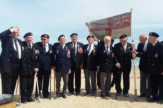 Jack Bracewell (third left) with other war veterans during his recent visit to Normandy.