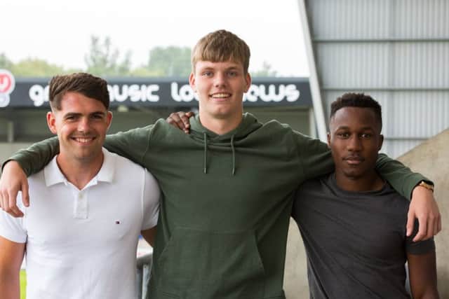 Morecambe's new first-year professionals Ben Hedley, Niall Maher and Steve Yawson. Picture: Matt Rushton