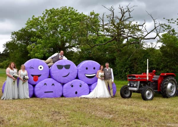 Chris and Cath Halhead at their wedding at the weekend. They featured the purple bales to highlight WellChild - the national charity for sick children. Picture by Emma Dawson.