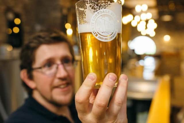 Co-owner James Law raises a glass to the six month anniversary of The Royal Barn, Kirkby Lonsdale. Photo by Emma Dickinson Photography