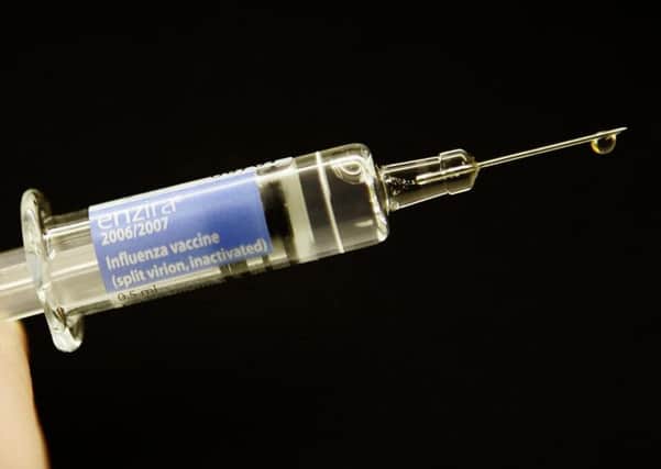 Flu jab syringe injection / immunisation / inoculation