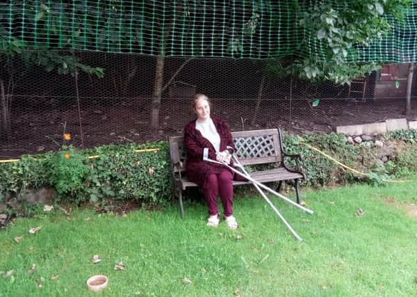 Tina Wilkinson next to the empty chicken run at her house. She has decided to close her charity Hedwig's House due to ill health.