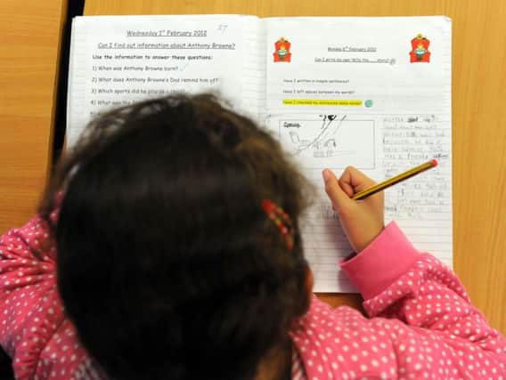 Almost 40% of primary school pupils in England failed to meet the Government's expected standard in reading, writing and maths, national SATs tests results show