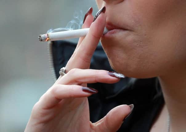 Smoking can cause lung cancer. Health bosses are urging people with breathlessness or a persistent cough to visit their GP.