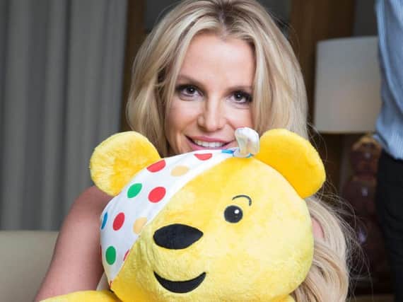 Britney Spears holding Pudsey Bear