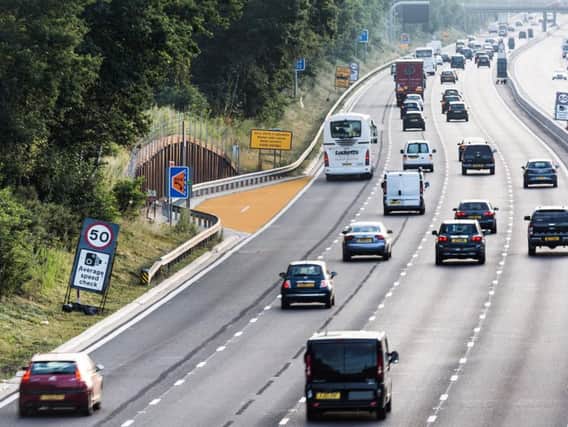 An emergency refuge area on smart motorways which are being painted orange