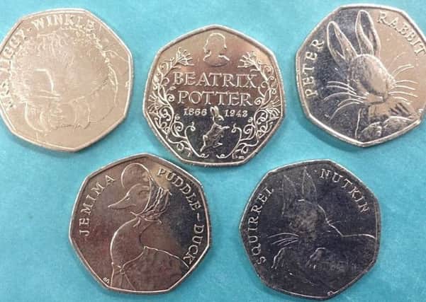 Beatrix Potter coins similar to the ones donated.