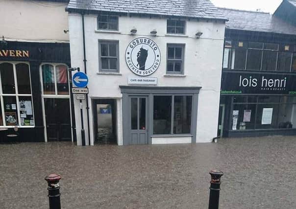 Lower Church Street during flash flooding in Lancaster city centre on Wednesday evening. Photo shared by Go Burrito.