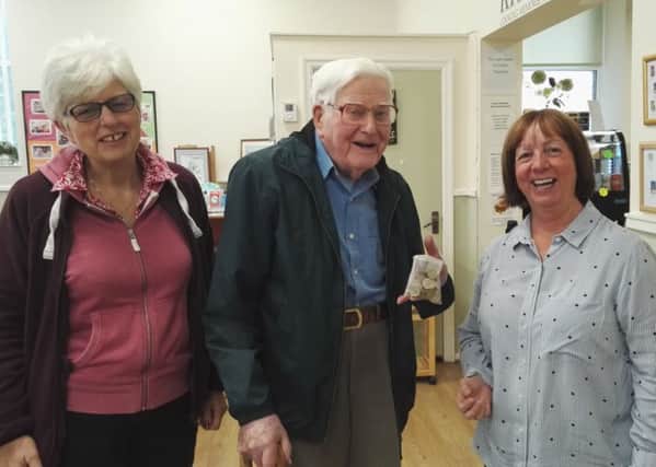 Eric Maggs (centre) with his daughter Linda Macluskie and Susan Wilson, manager of the Rainbow Centre in Morecambe.