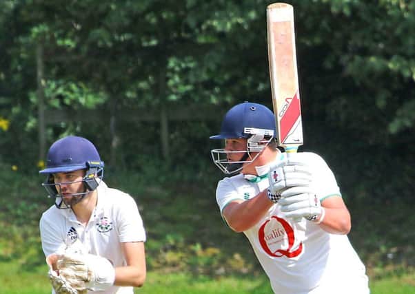 Alex Briggs goes on the attack during his 62 from 65 balls for Westgate. Picture: Tony North