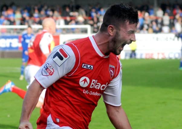 Padraig Amond celebrate's after scoring a dramatic header to win the game for The Shrimps against Chesterfield.