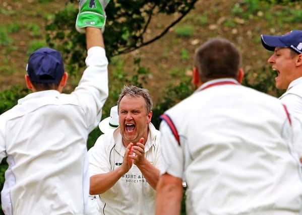 Torrisholme's Graham Lee celebrates his wicket. Picture: Tony North.