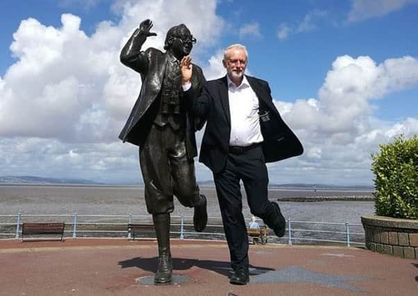 Jeremy Corbyn at the Eric Morecambe statue during his visit to Morecambe. Photo by Alan Gregson.