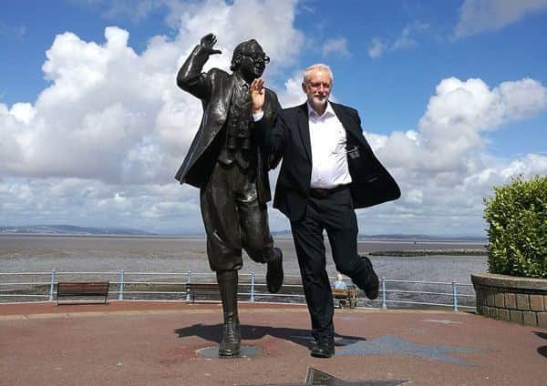 Jeremy Corbyn at the Eric Morecambe statue during his visit to Morecambe. Picture by Alan Gregson.