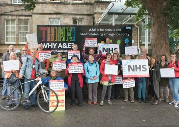Protestors greeting Health Secretary Jeremy Hunt arriving at the Royal Lancaster Infirmary for a private meeting. Photo: Anna Lee.