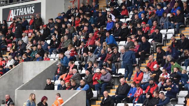 The crowd at the Globe Arena during Morecambe's pre-season match with Lancaster City. Morecambe's 2015/16 accounts have been published.