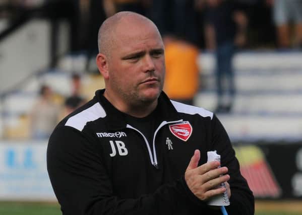 Jim Bentley salutes the fans after the draw at Cambridge.