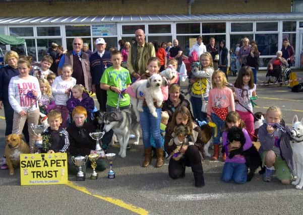 Children with their dogs and organisers at the event in 2012.