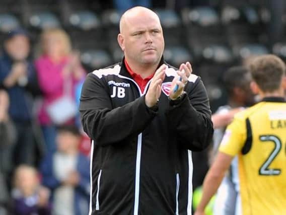 Jim Bentley salutes the Morecambe fans at the final whistle. Picture: B&O PRESS PHOTO