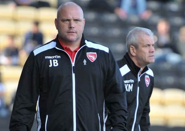 Jim Bentley looks on during the Shrimps defeat at Notts County Picture: B&O PRESS PHOTO