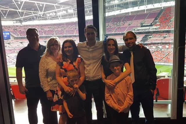 Sarah and Dave Fisher with Harley and other family members in their box at Wembley for the Championship Play-Off Final between Huddersfield Town and Reading.