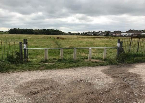 Bollards and a barrier have been put up at a field at the end of Lordsome Road which dog walkers use.