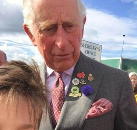 Liam Birch from Morecambe Community High School gets a selfie with Prince Charles.