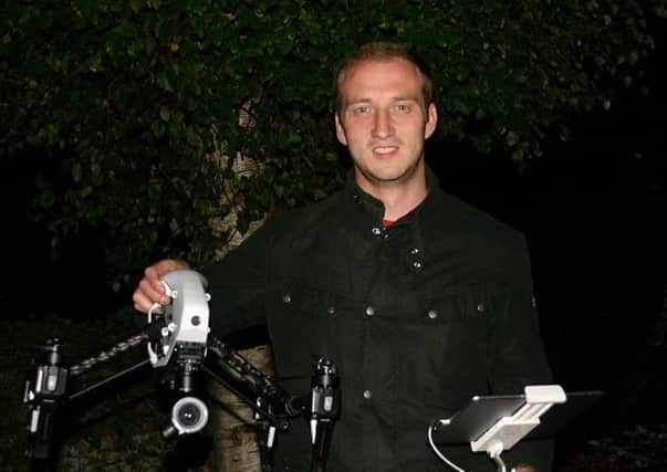 Jack Cordingley with one of his drones.