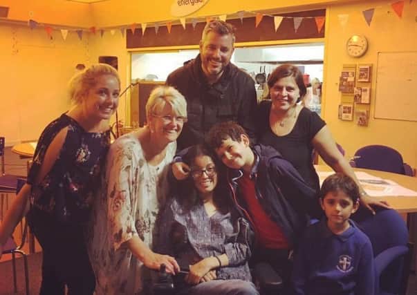 From left Kelly Louise Smith, Sharon Jackon, founder of the Neuro Centre with Nayeli Cookson, centre, Guy Cookson, above and sons Oscar and Mateo and a family friend.