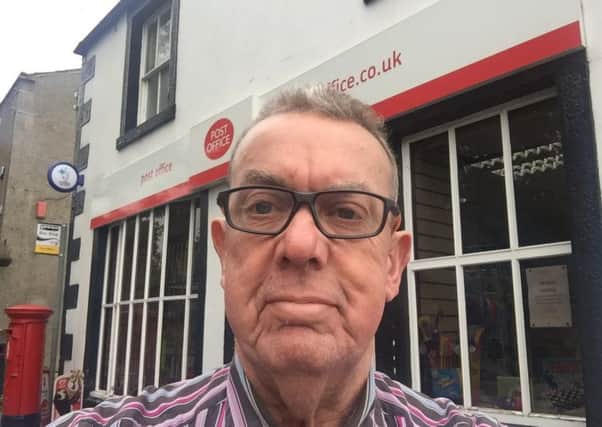Conservative City Councillor for Bolton-le-Sands and Slyne ward, John Wild outside Bolton-le-Sands post office.